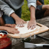 Family making a pizza