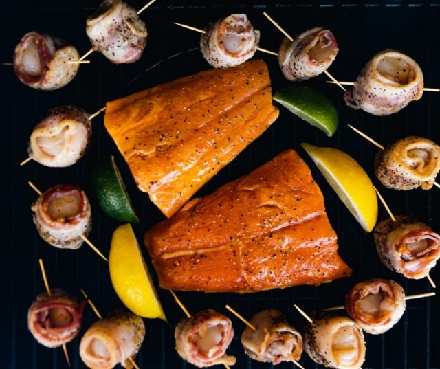 Smokey, citrus-y, bacon-y. Need we say more? 
- - - - -
#seasfood #pelletsmoked #baconwrapped #citrus #scallops #salmonrecipe