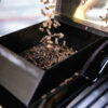 Pellets being loaded into a Prime300 Countertop Pellet Grill