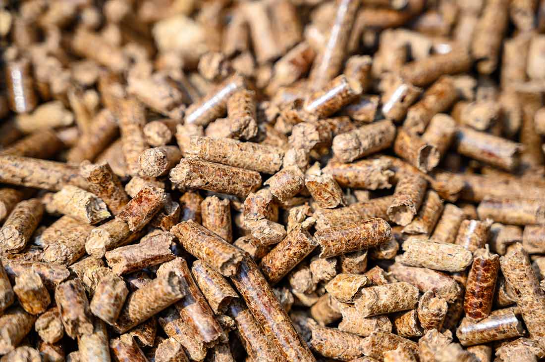 A closeup of barbecue wood pellets.
